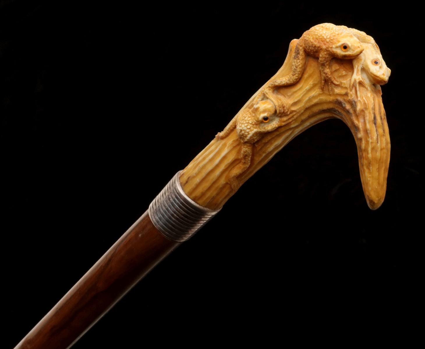 A 19TH C. CROOK HANDLE CANE WITH CARVED STAG HANDLE