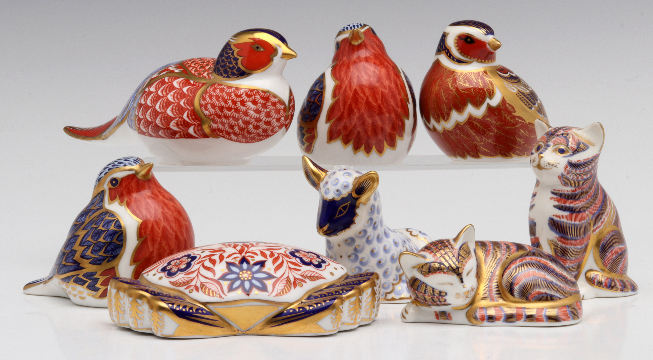 A COLLECTION OF 8 ROYAL CROWN DERBY PAPERWEIGHT FIGURES