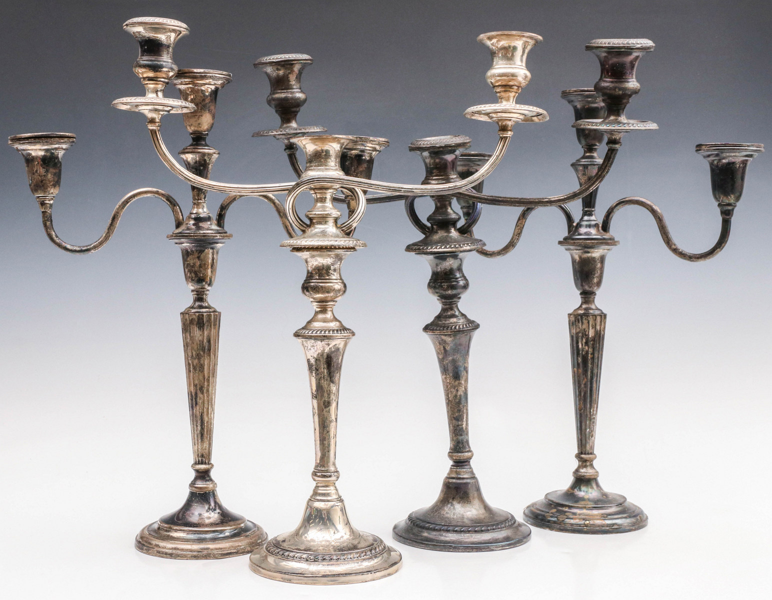TWO PAIR WEIGHTED STERLING SILVER CANDELABRA, AS FOUND