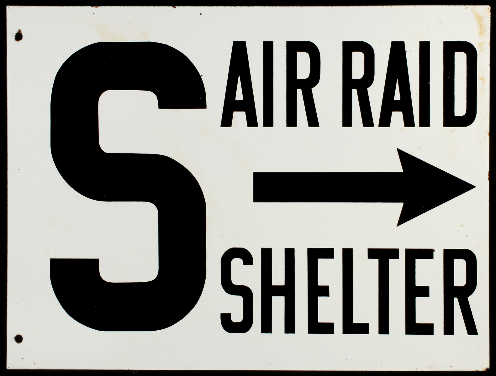 A PORCELAIN ENAMEL AIR RAID SHELTER SIGN WITH ARROW