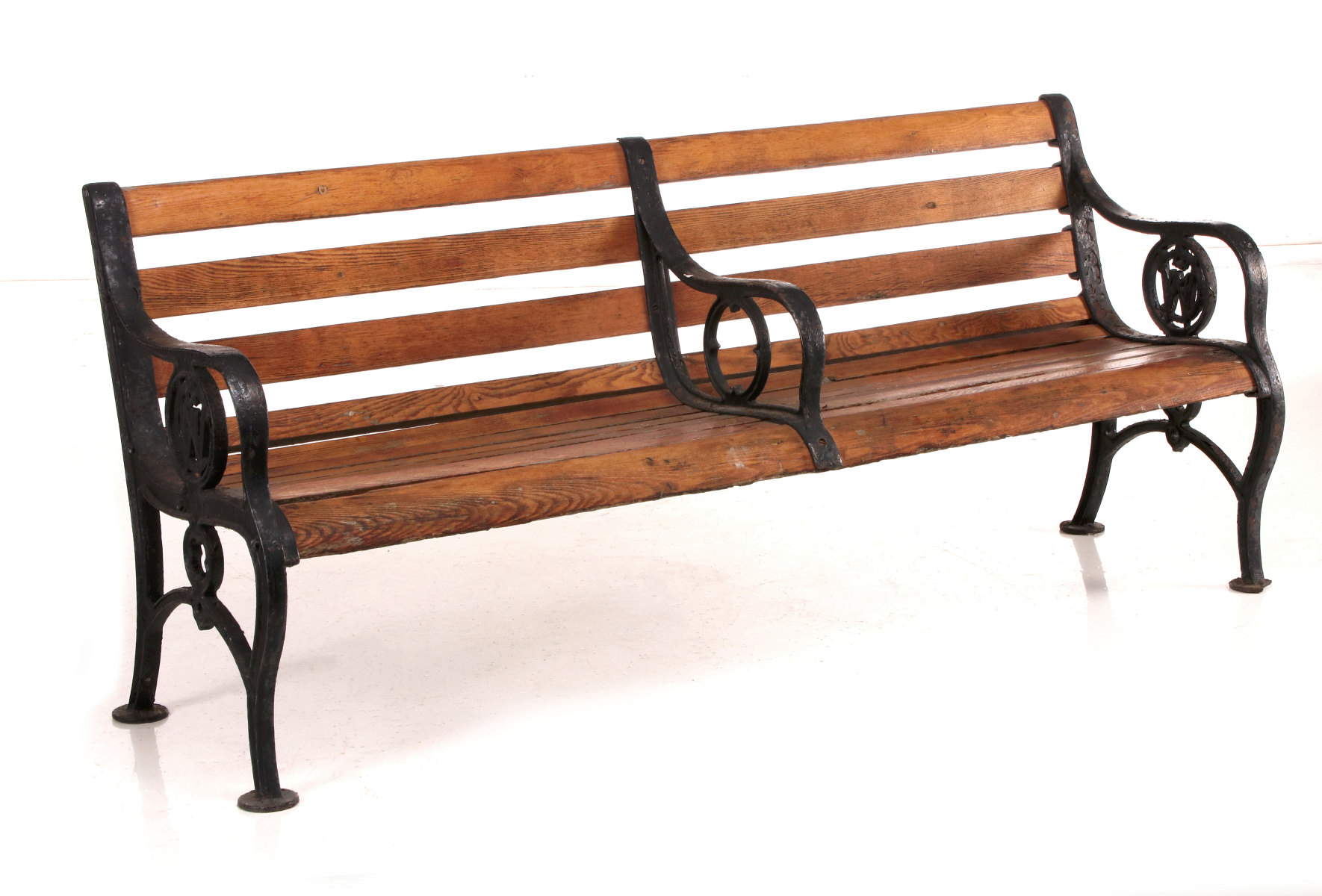 A 19TH C BENCH WITH CAST IRON C. & N. W. RAILROAD LOGOS