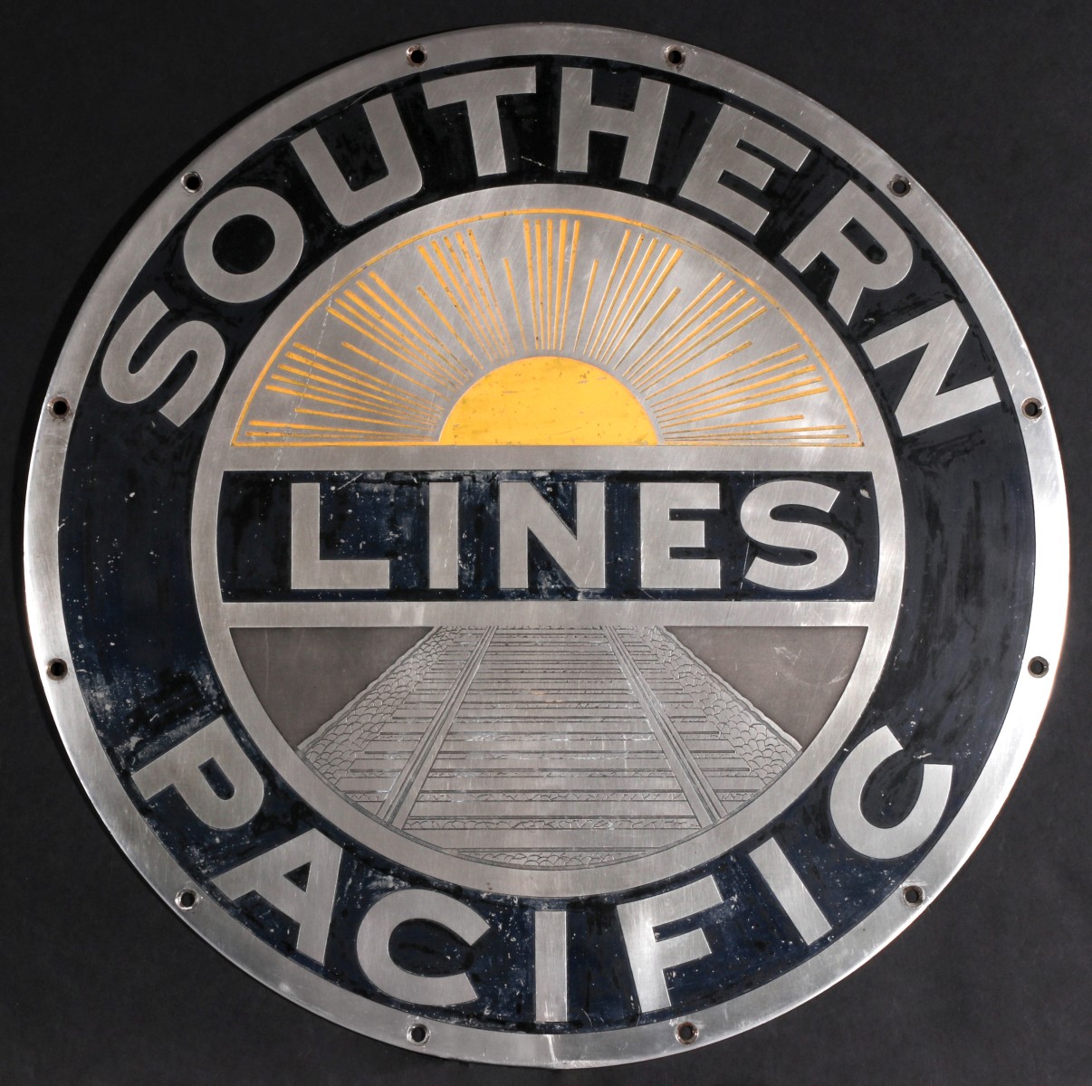 AN ENAMELED STAINLESS SOUTHERN PACIFIC LINE ENGINE SIGN