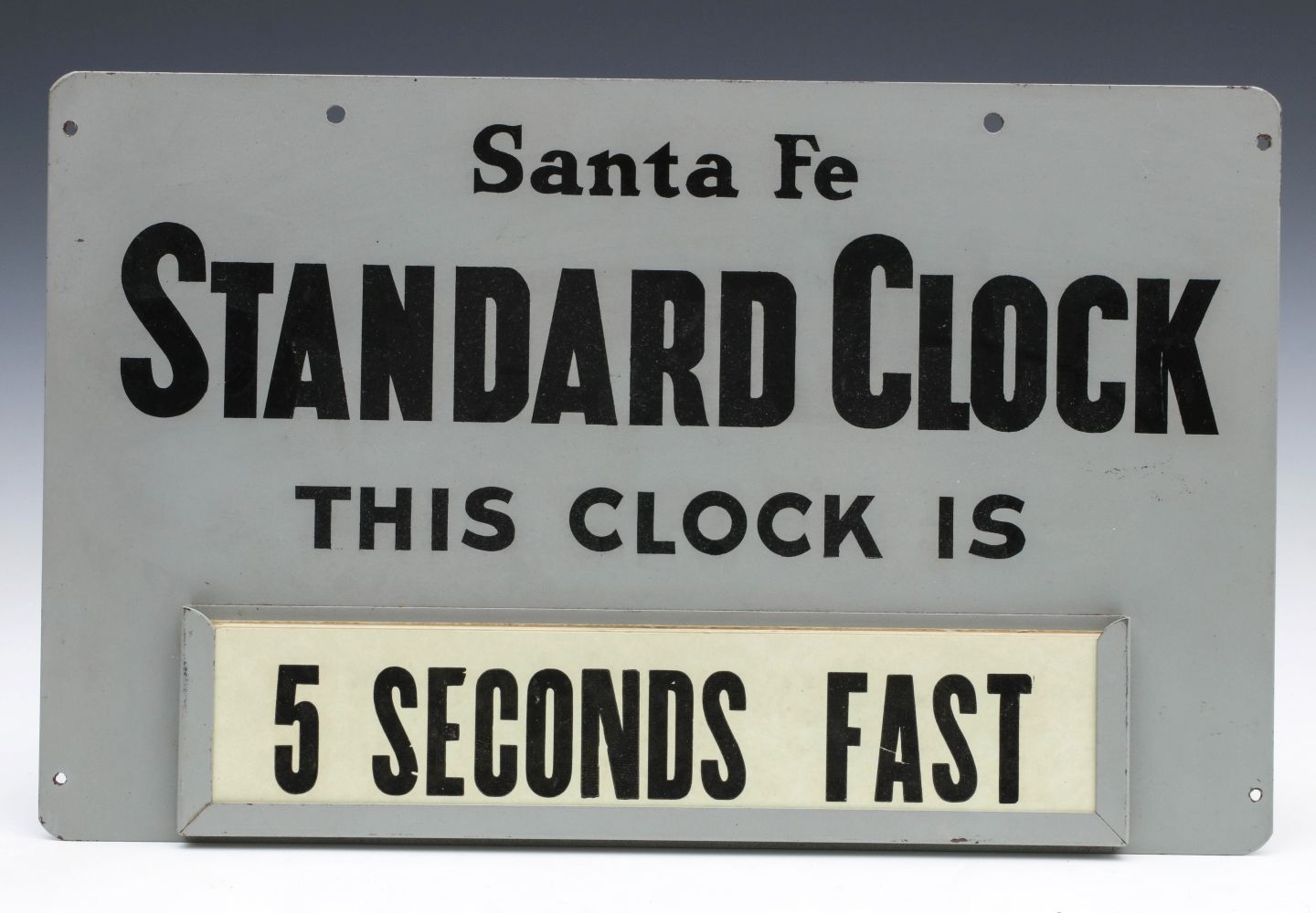 A SANTA FE 'STANDARD CLOCK' SIGN WITH ACCURACY PLACARDS