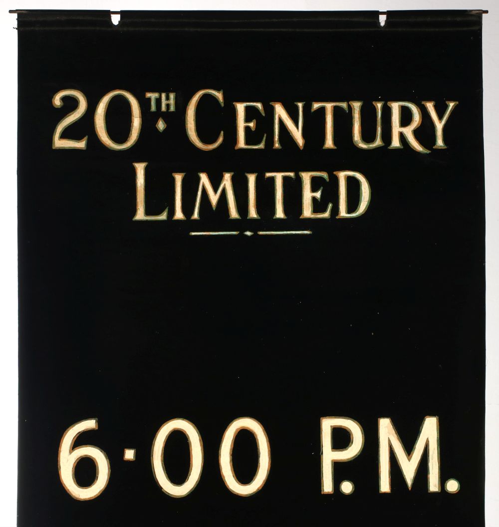 A HAND PAINTED GATE SIGN FOR THE 20TH CENTURY LIMITED