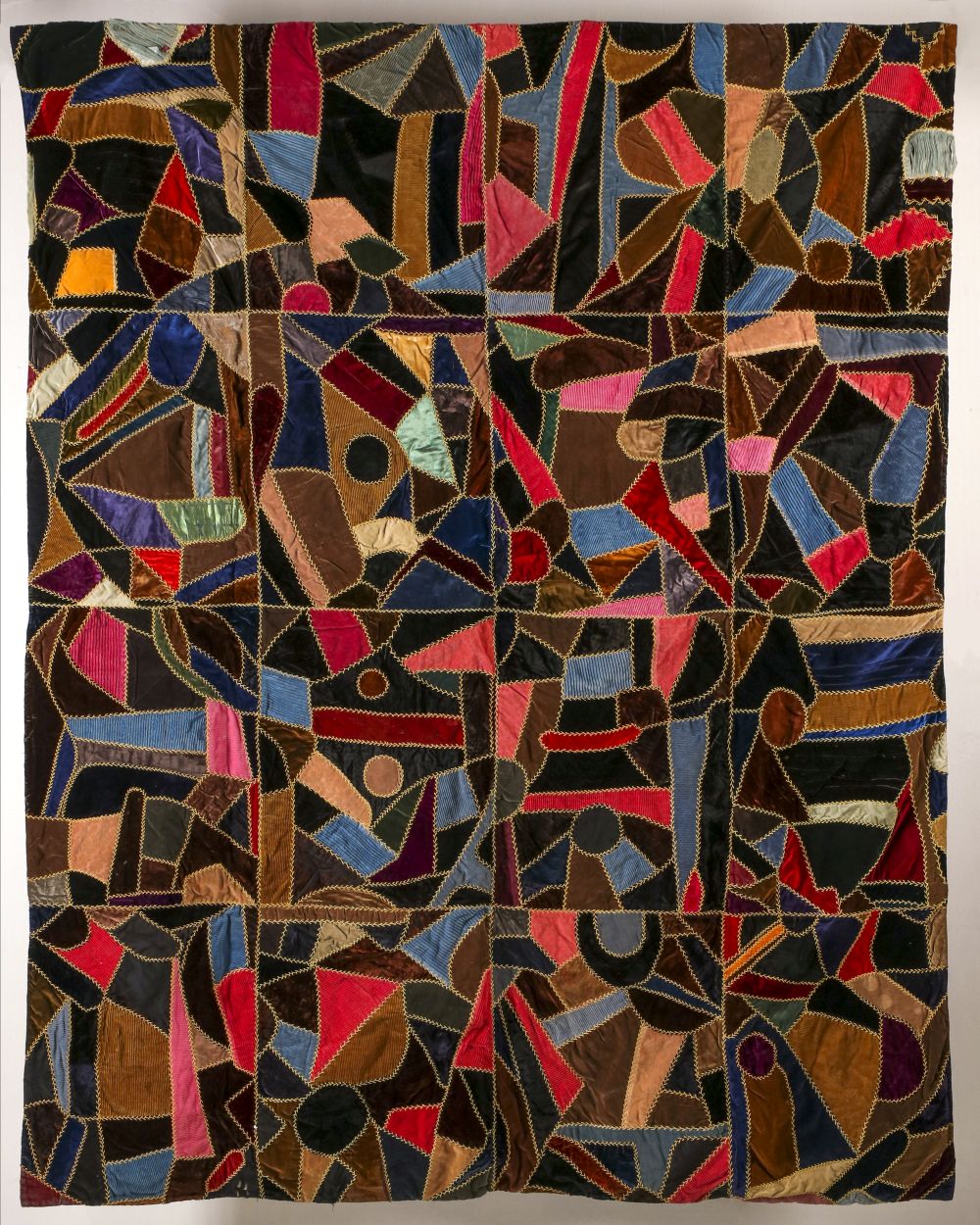 AN INTERESTING ANTIQUE ABSTRACT CRAZY QUILT