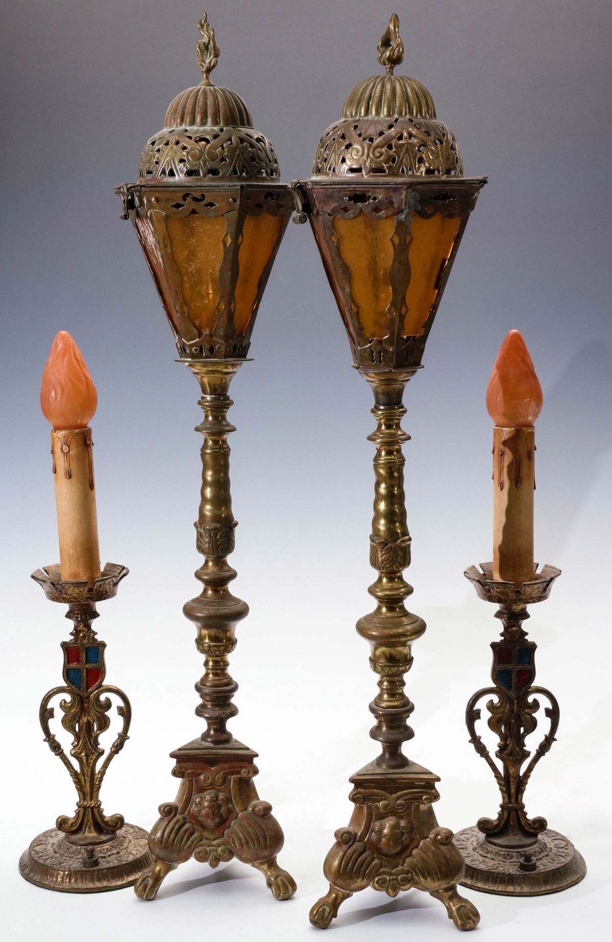 EARLY 20TH CENTURY BRASS ALTAR LIGHTS AND CANDLESTICKS