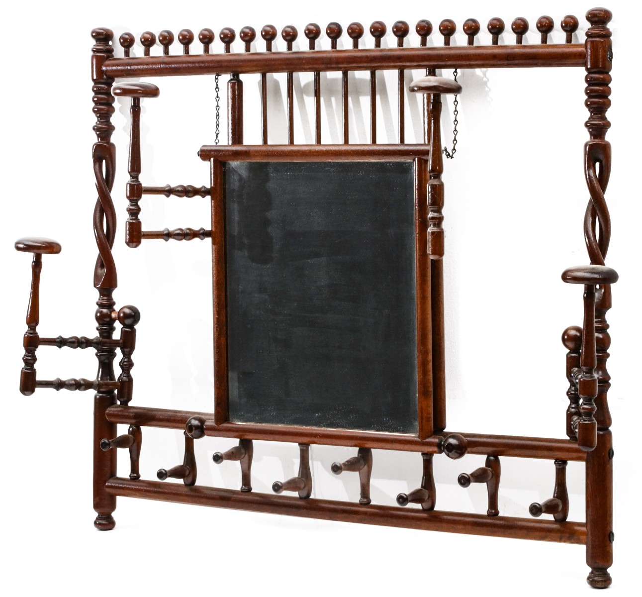 A CARVED, TURNED HALL RACK WITH STICK-AND-BALL DECOR
