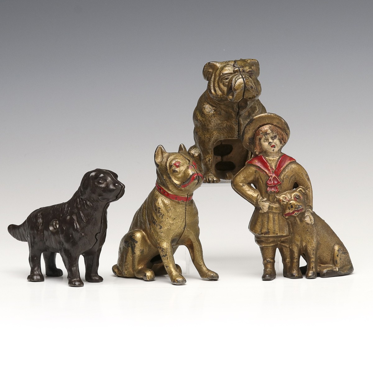 BUSTER BROWN AND OTHER ANTIQUE DOG FIGURAL IRON BANKS