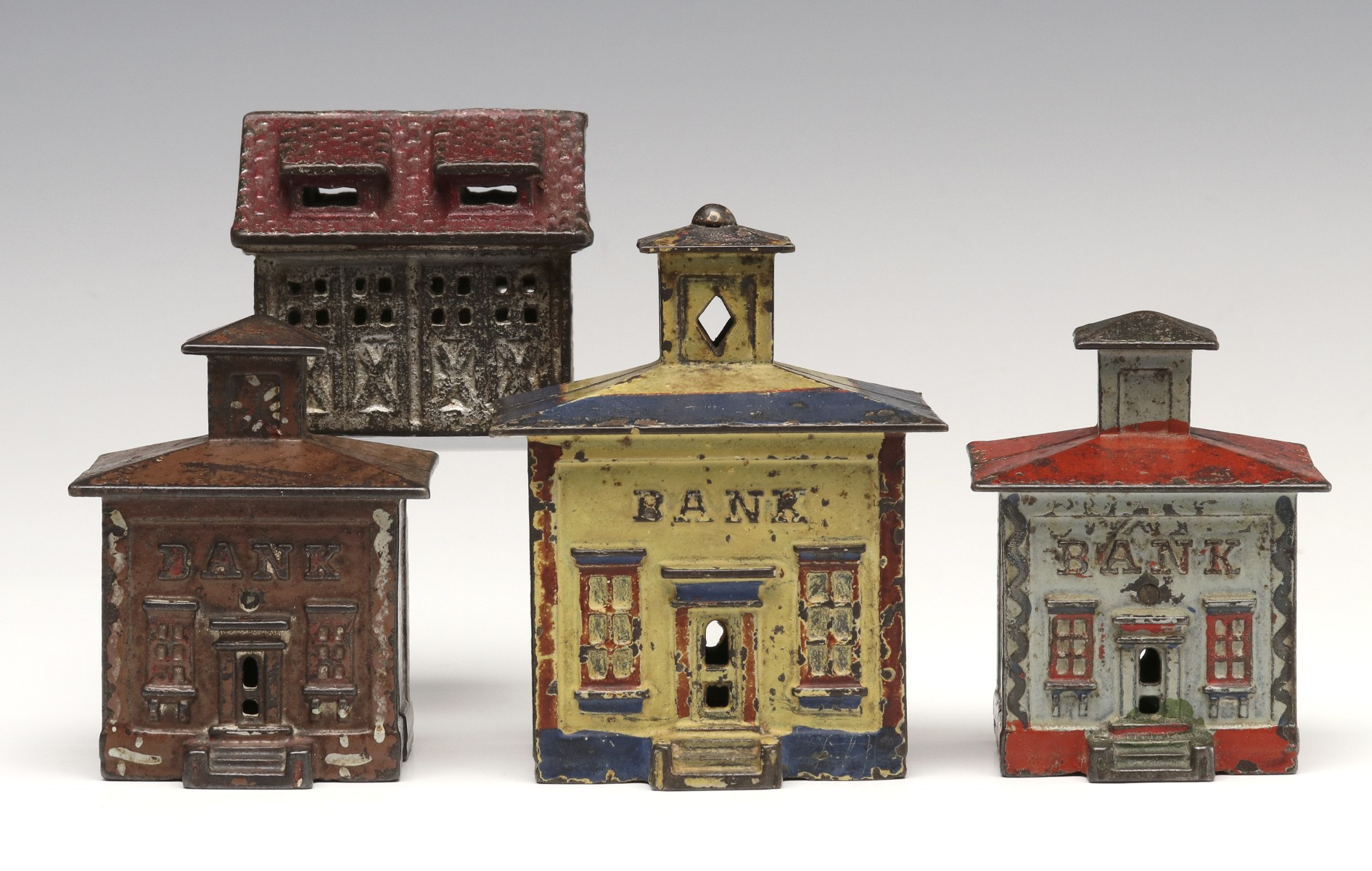 A COLLECTION OF CAST IRON STILL BANK BUILDINGS