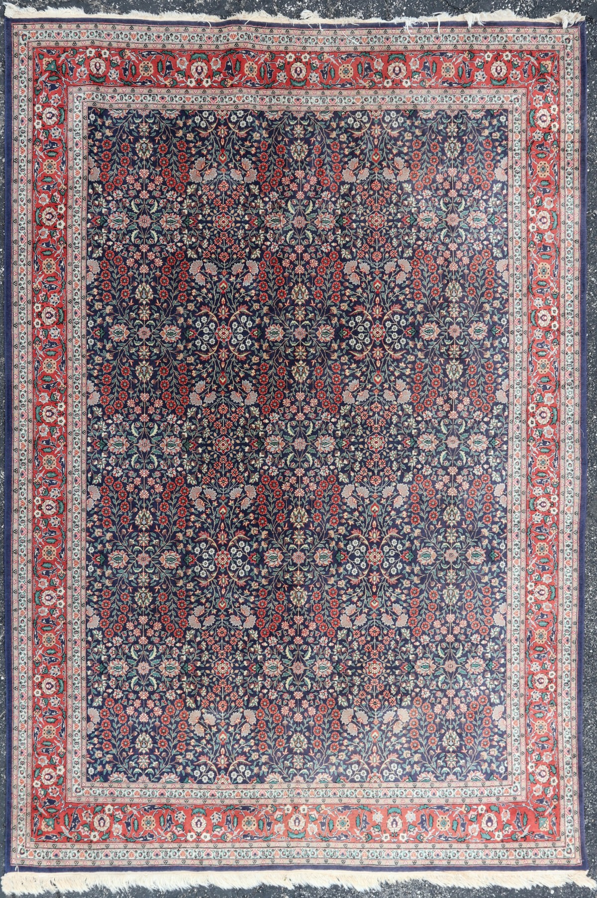 A ROOM-SIZED HAND MADE INDO PERSIAN CARPET