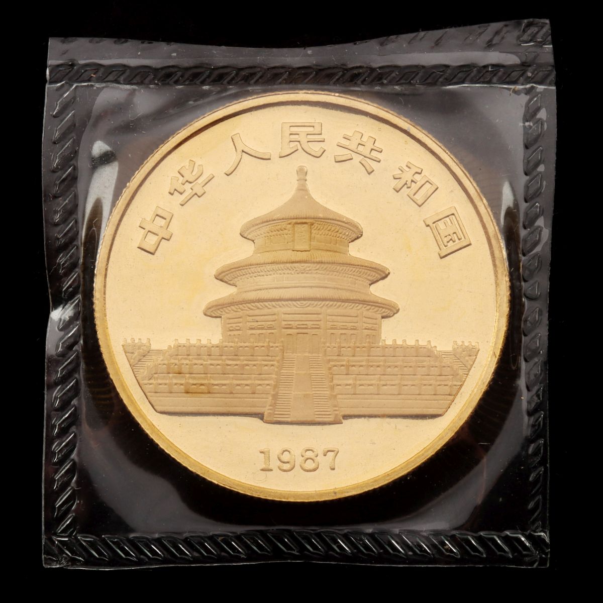 A 1987 CHINESE 1 OZ. GOLD PANDA COIN