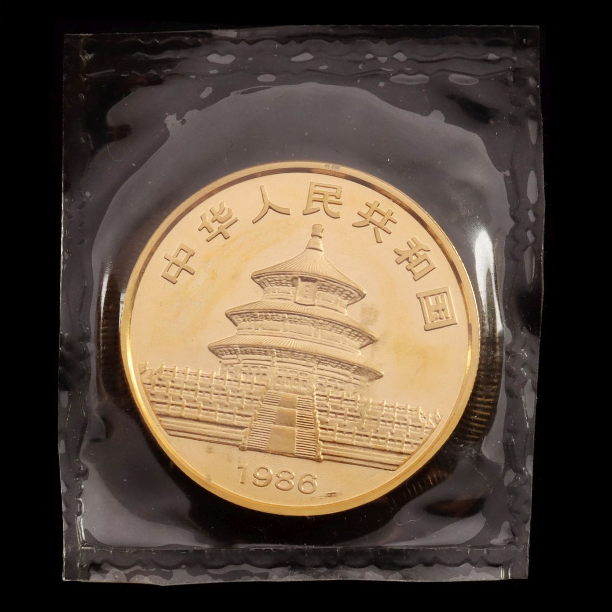 A 1986 CHINESE 1 OZ. GOLD PANDA COIN