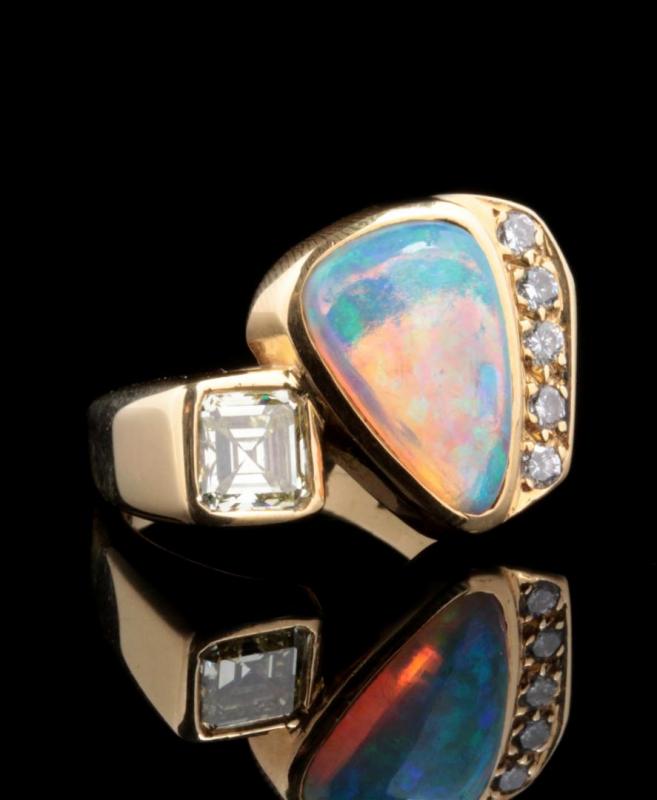 AN 18K CONTEMPORARY DESIGN OPAL AND DIAMOND RING
