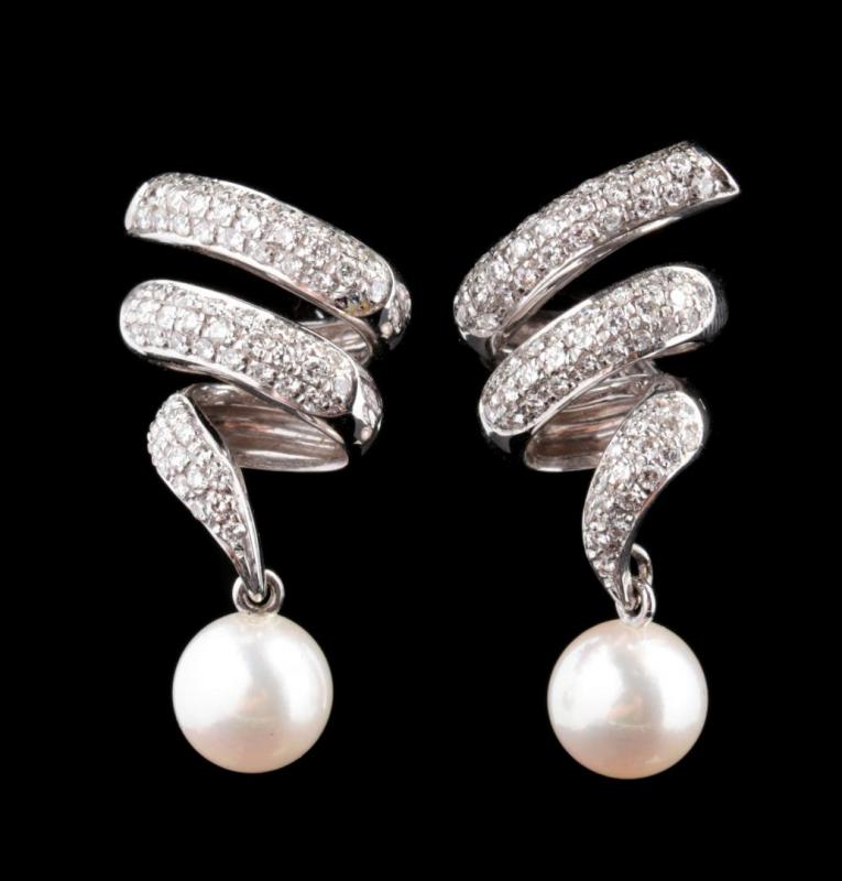 A PAIR PEARL AND DIAMOND SWIRL EARRINGS IN 14K GOLD