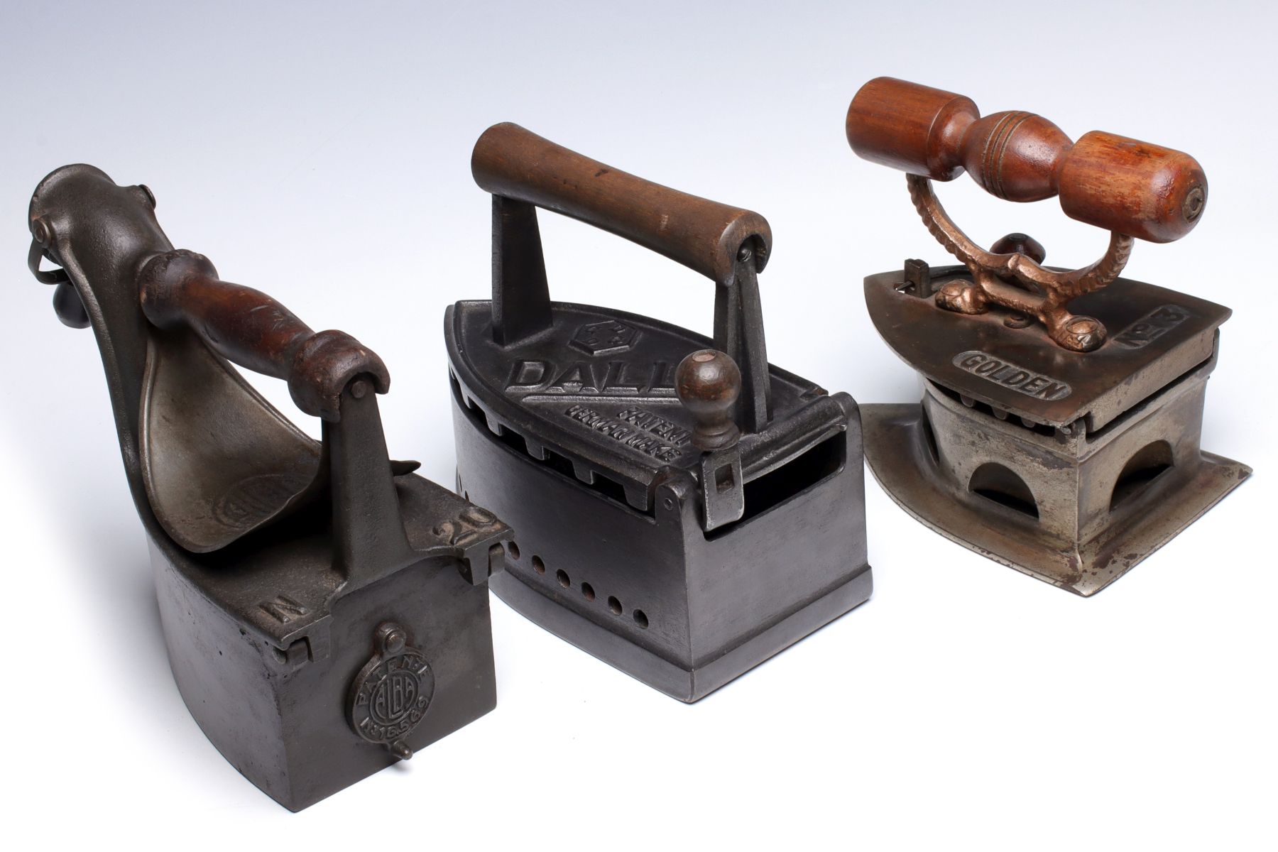 THREE ANTIQUE CHARCOAL IRONS