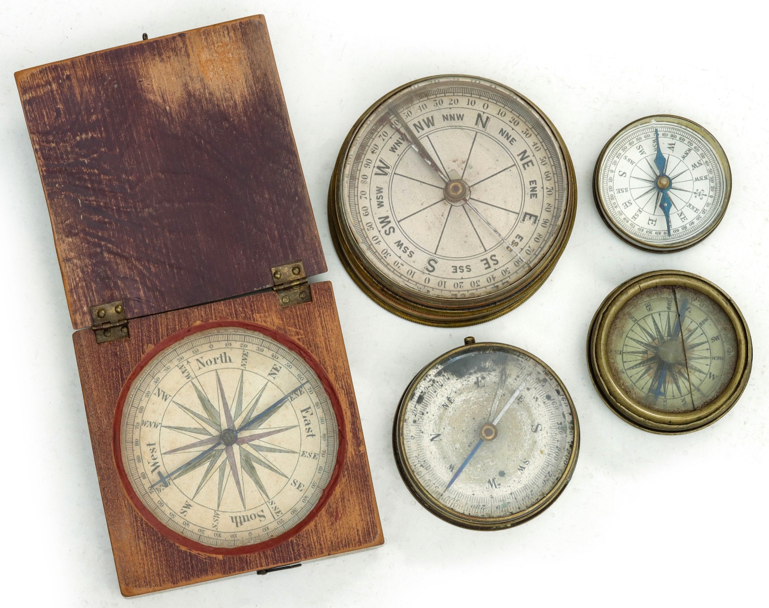 A COLLECTION OF 19TH C. POCKET COMPASSES