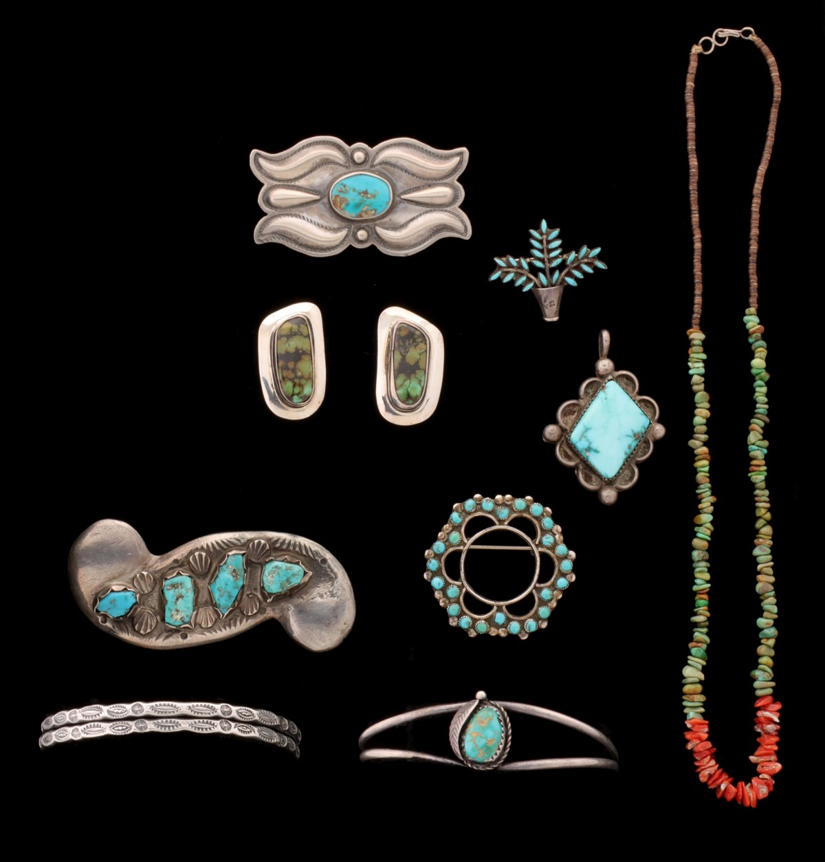 A COLLECTION OF NAVAJO STERLING AND TURQUOISE JEWELRY