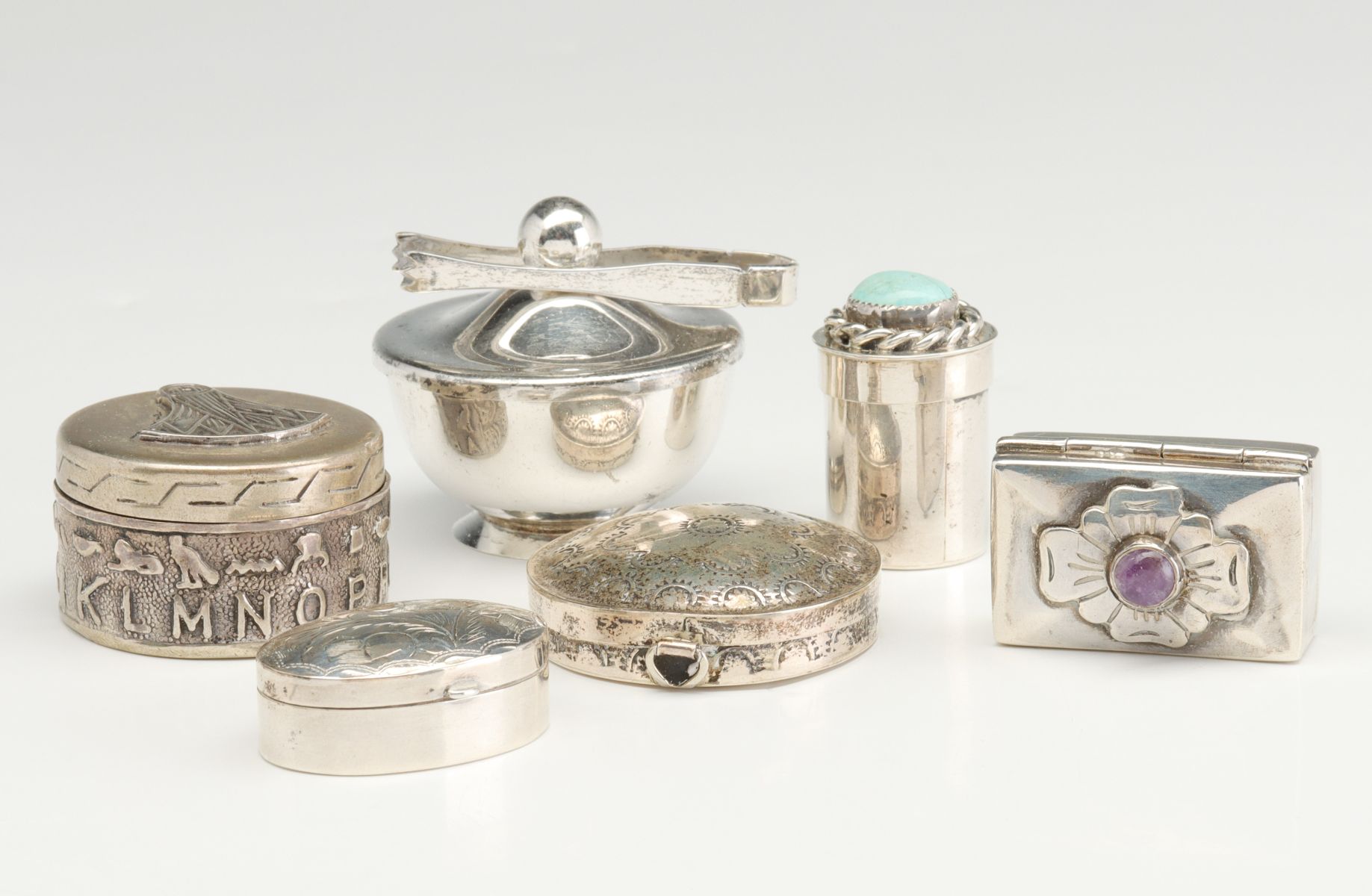 A COLLECTION OF SIX STERLING AND SILVER CONTAINERS