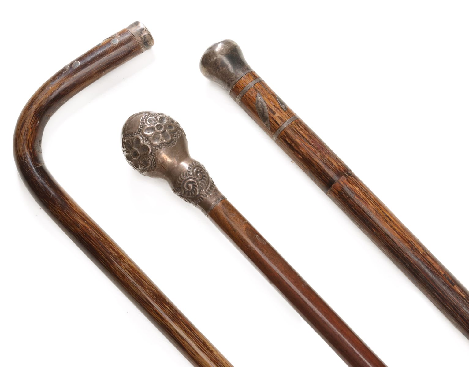 STERLING SILVER AND PARTRIDGE WOOD WALKING STICKS