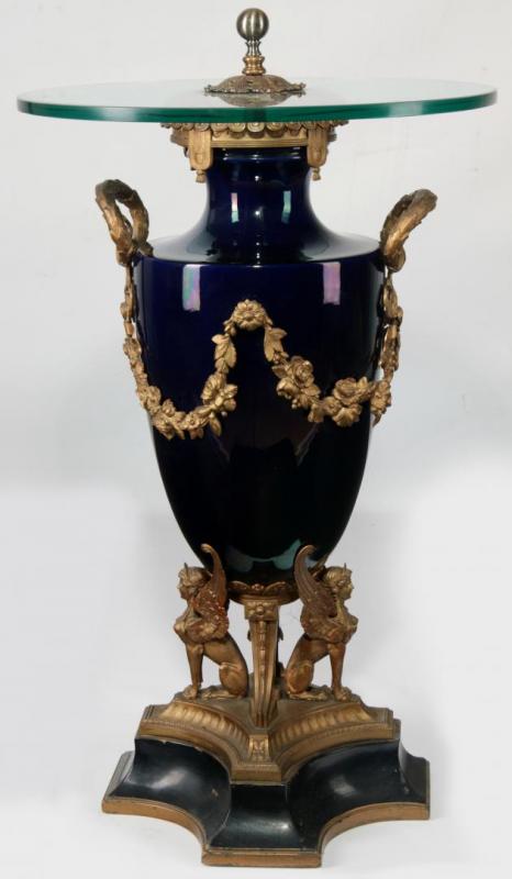 A BRONZE MOUNTED PORCELAIN URN ADAPTED TO A SIDE TABLE