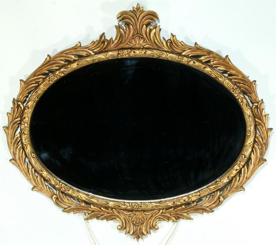 A MID 20TH CENTURY CARVED AND GILDED WOOD MIRROR. 
