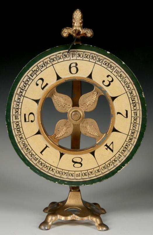 A VINTAGE 'FRENCH GAME AND NOVELTY CO' ROULETTE WHEEL 