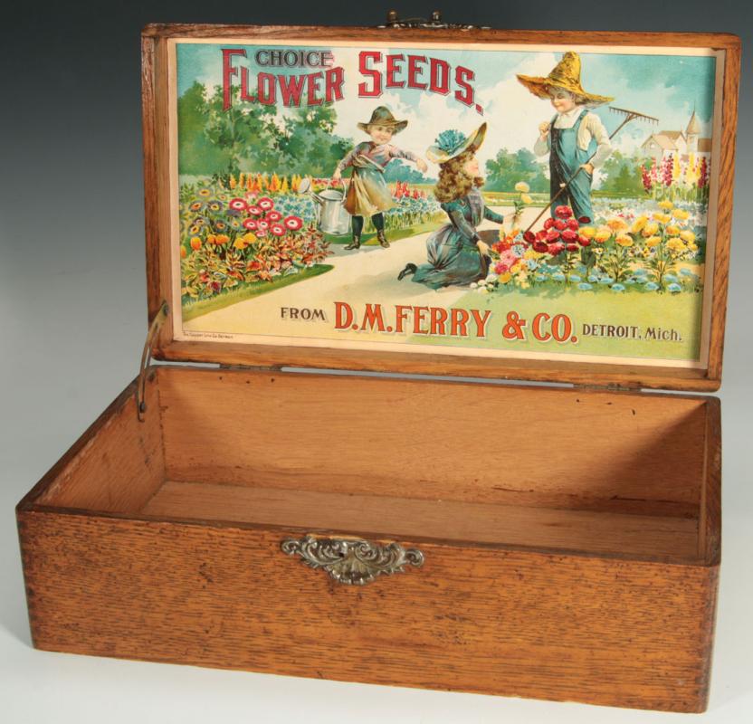 A CIRCA 1900 FERRY SEED BOX WITH GRAPHIC OF CHILDREN