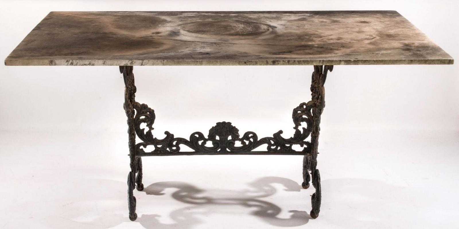 A 19TH CENTURY CAST IRON GARDEN TABLE WITH MARBLE TOP