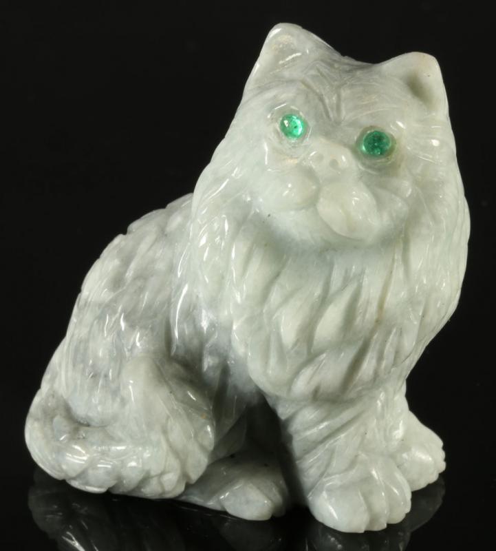 CARVED GLASS FIGURE OF A CAT WITH EMERALD EYES