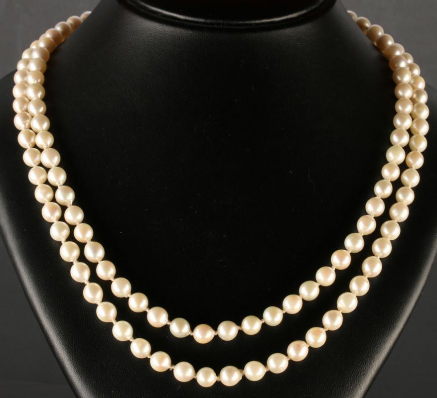 A 48-INCH DOUBLE STRAND CULTURED PEARL ROPE 