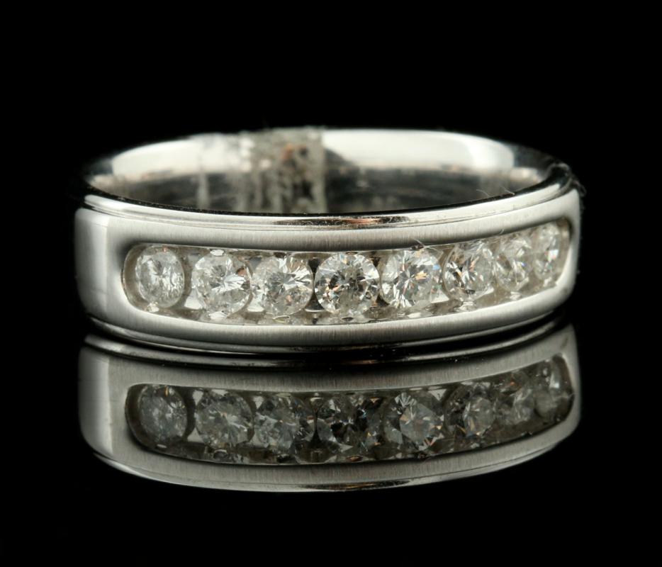 A GENT'S 14K DIAMOND WEDDING BAND APPROX .80 CT TW