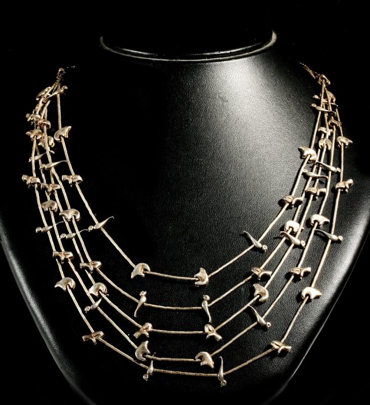 A STERLING SILVER ZUNI FETISH NECKLACE