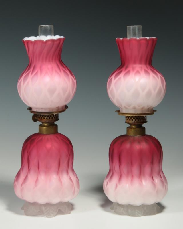 A PAIR CRANBERRY MOTHER OF PEARL MINI LAMPS