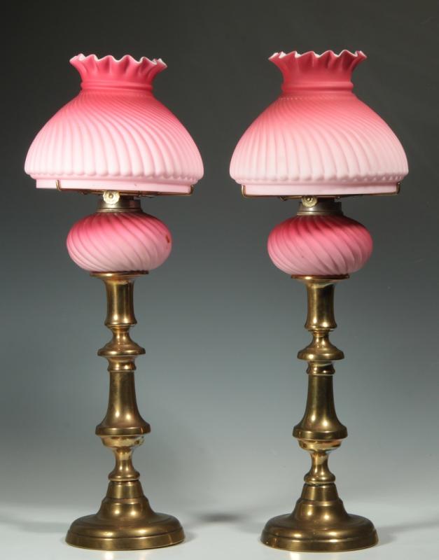A PAIR PINK SATIN PEG LAMPS WITH SHADES