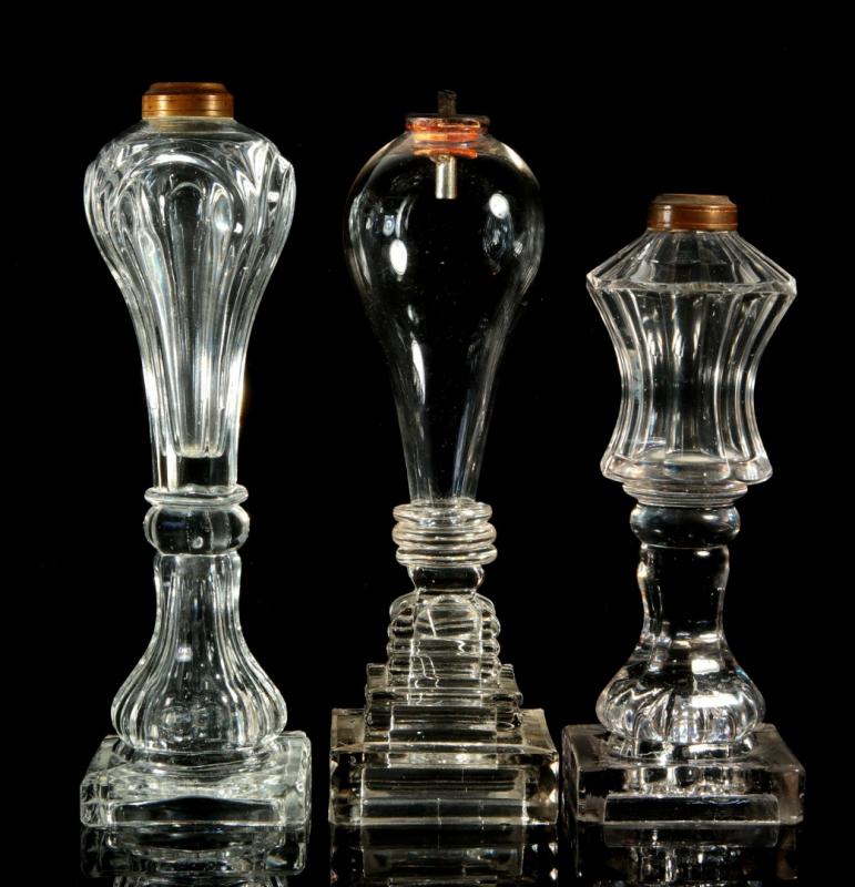 A COLLECTION OF FLINT GLASS WHALE OIL LAMPS