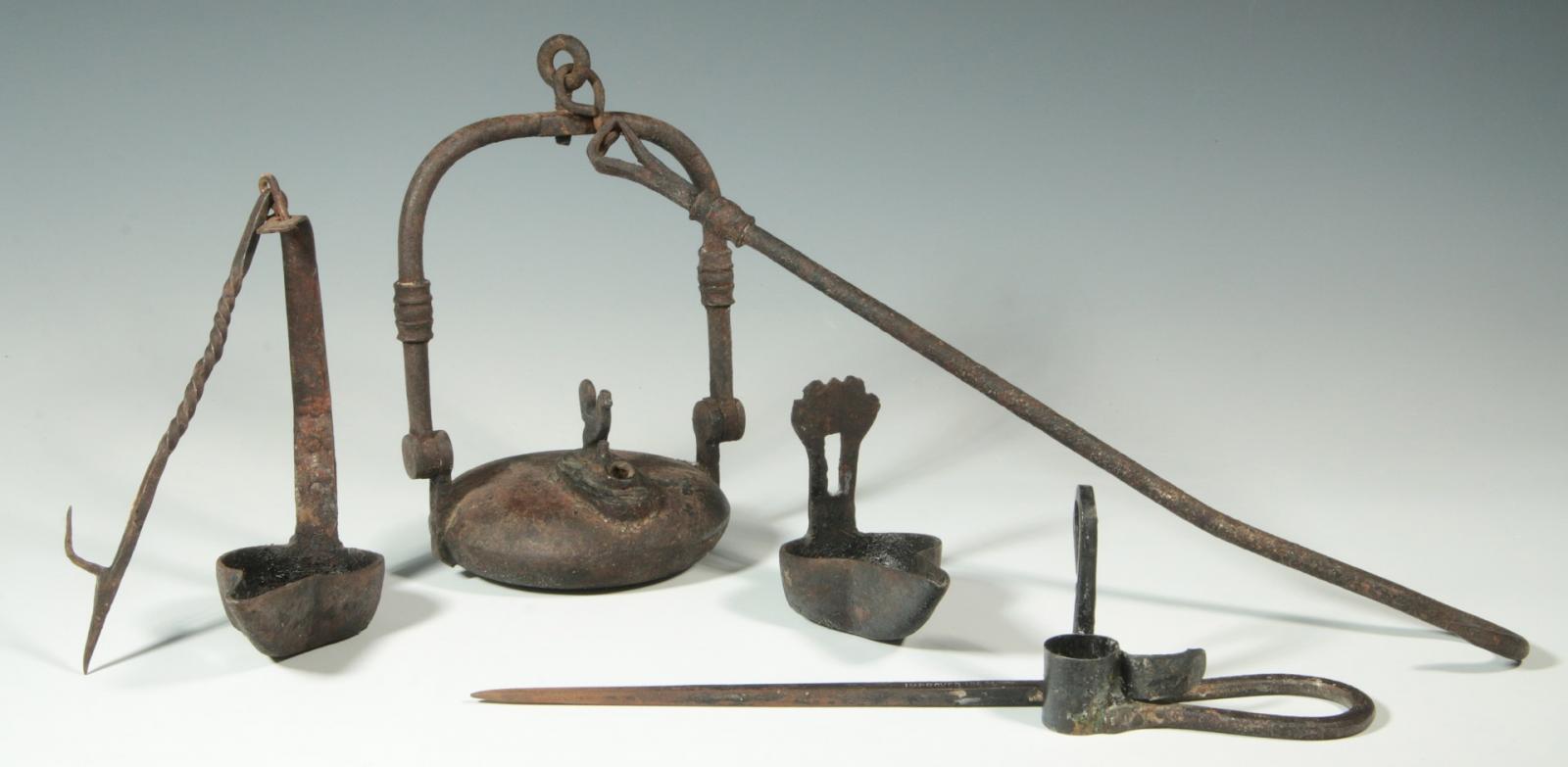 A COLLECTION OF ANTIQUE IRON MINER'S LAMPS
