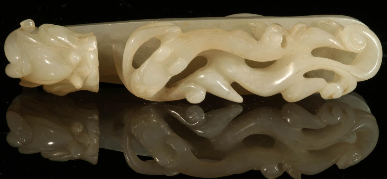 A CHINESE CARVED JADE BELT HOOK WITH DRAGON