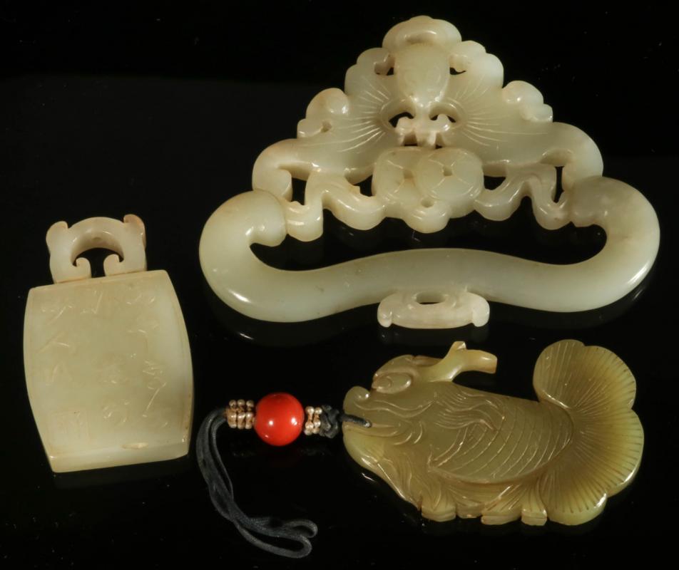 CARVED JADE BUCKLE AND PENDANTS