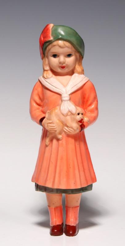A RARE SEVEN COLOR CELLULOID FIGURE OF GIRL AND DOG