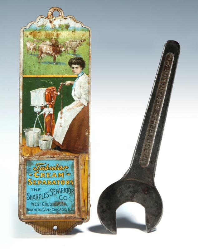 A SHARPLES CREAM SEPARATOR MATCH STRIKER AND WRENCH