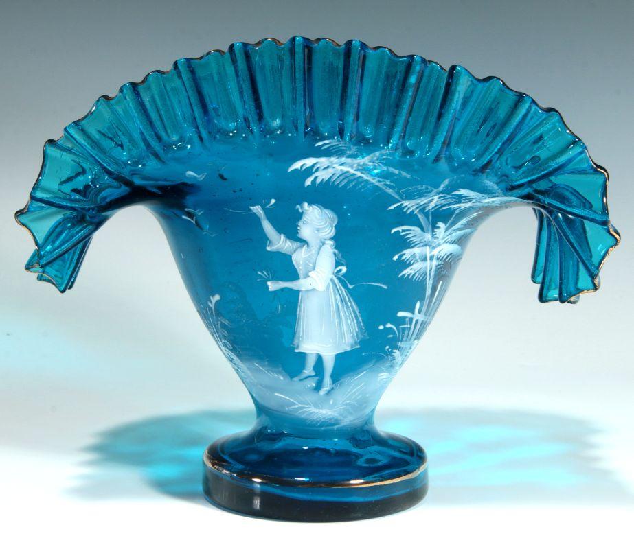 A BLUE FAN VASE WITH MARY GREGORY-TYPE DECORATION