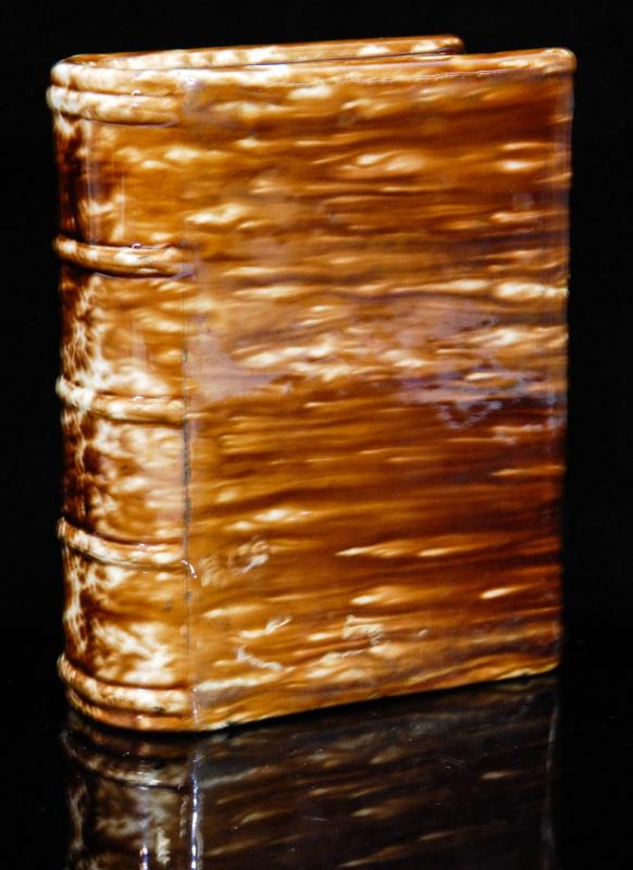 A 19TH CENTURY BENNINGTON POTTERY BOOK FLASK