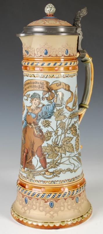A 17-INCH METTLACH ETCHED AND JEWELED STEIN #1940