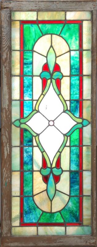 A 19TH CENTURY STAINED AND LEADED GLASS WINDOW
