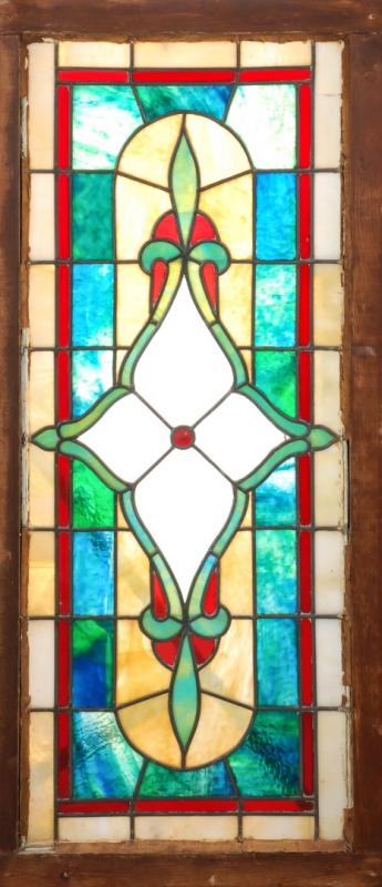 A 19TH CENTURY STAINED AND LEADED GLASS WINDOW