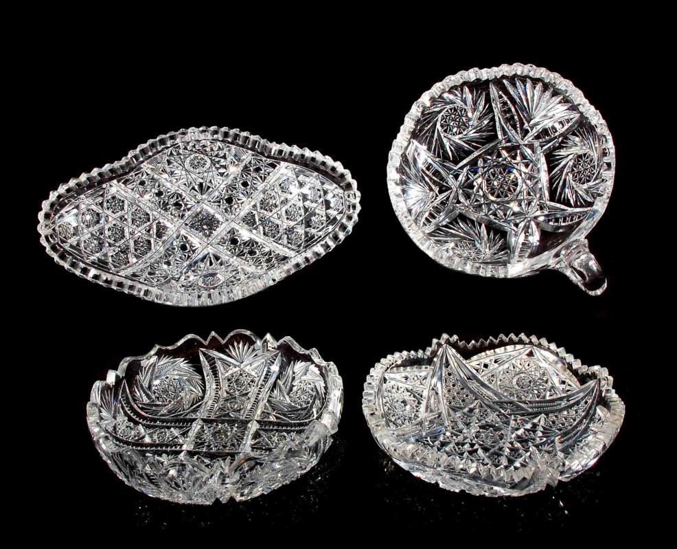 FOUR ABP CUT GLASS DISHES