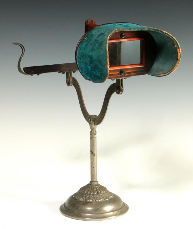 A PATTBERG-TYPE PATENT STERESCOPE ON ORNATE STAND