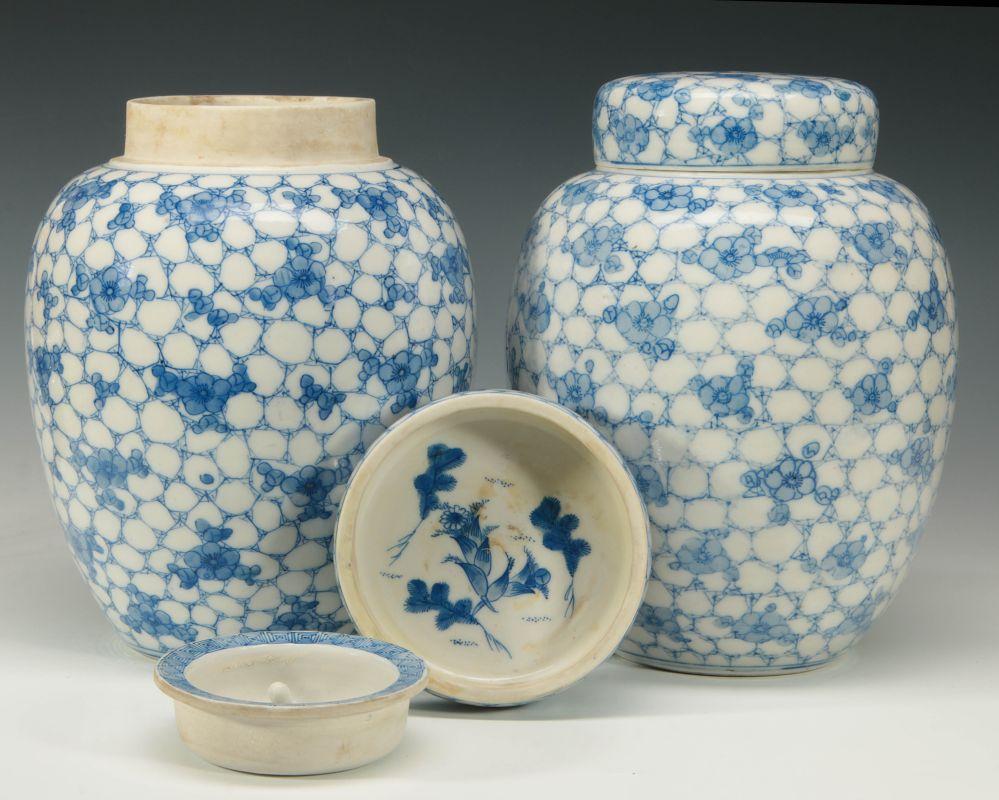 A PAIR MEIJI JAPANESE BLUE AND WHITE COVERED JARS