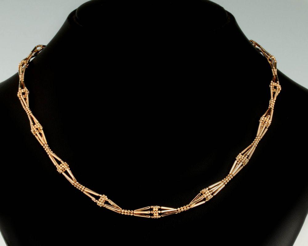 AN UNUSUAL 14K GOLD BEAD NECKLACE