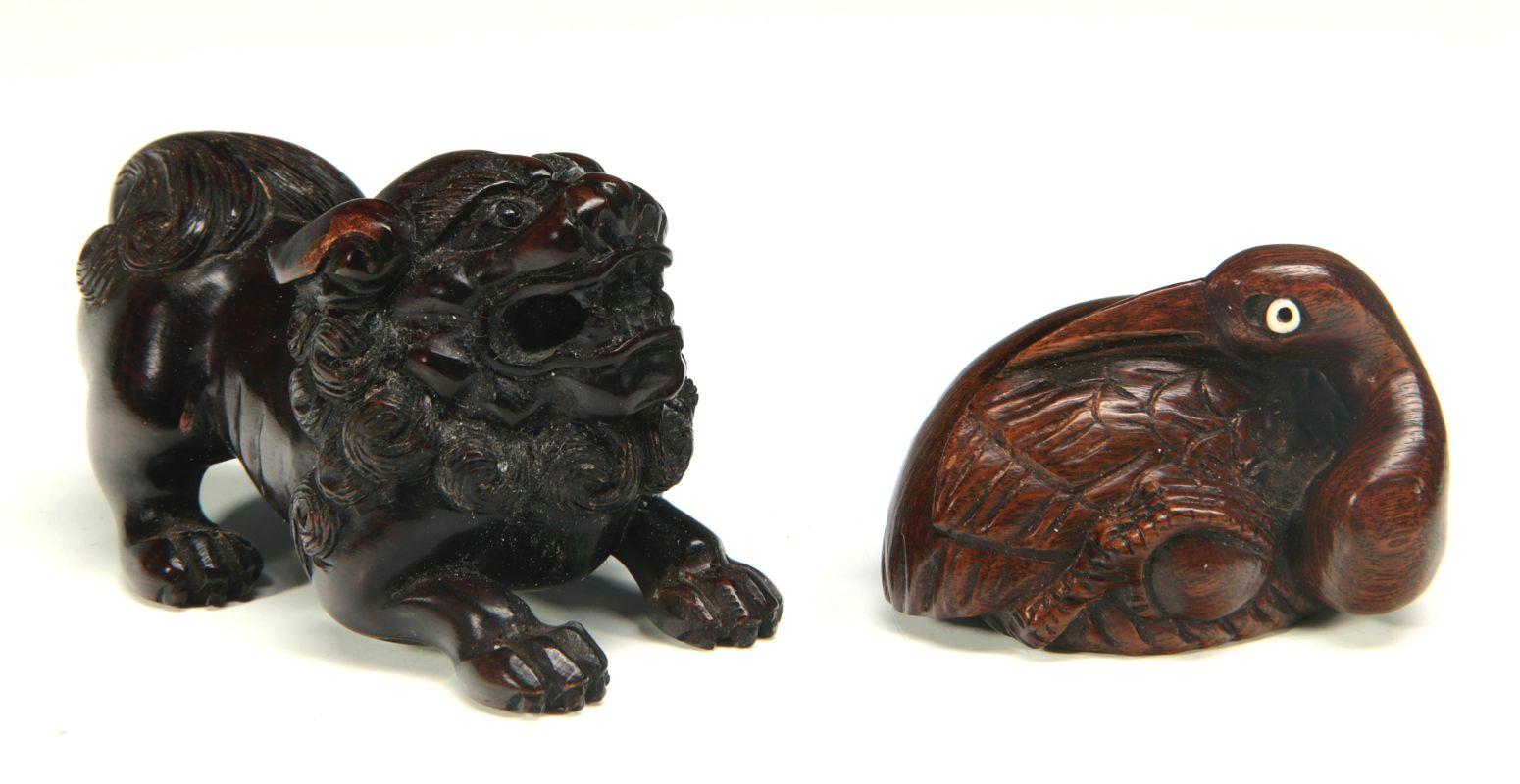 TWO CHINESE CARVED WOOD BOXWOOD NETSUKES